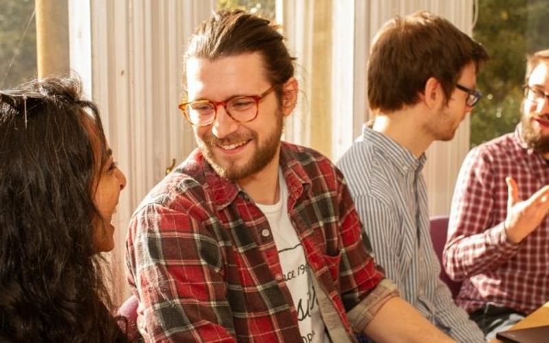 Untitled design Photo fo students talking and smiling