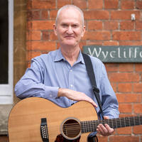 David Clifton in front of Wycliffe Hall sign