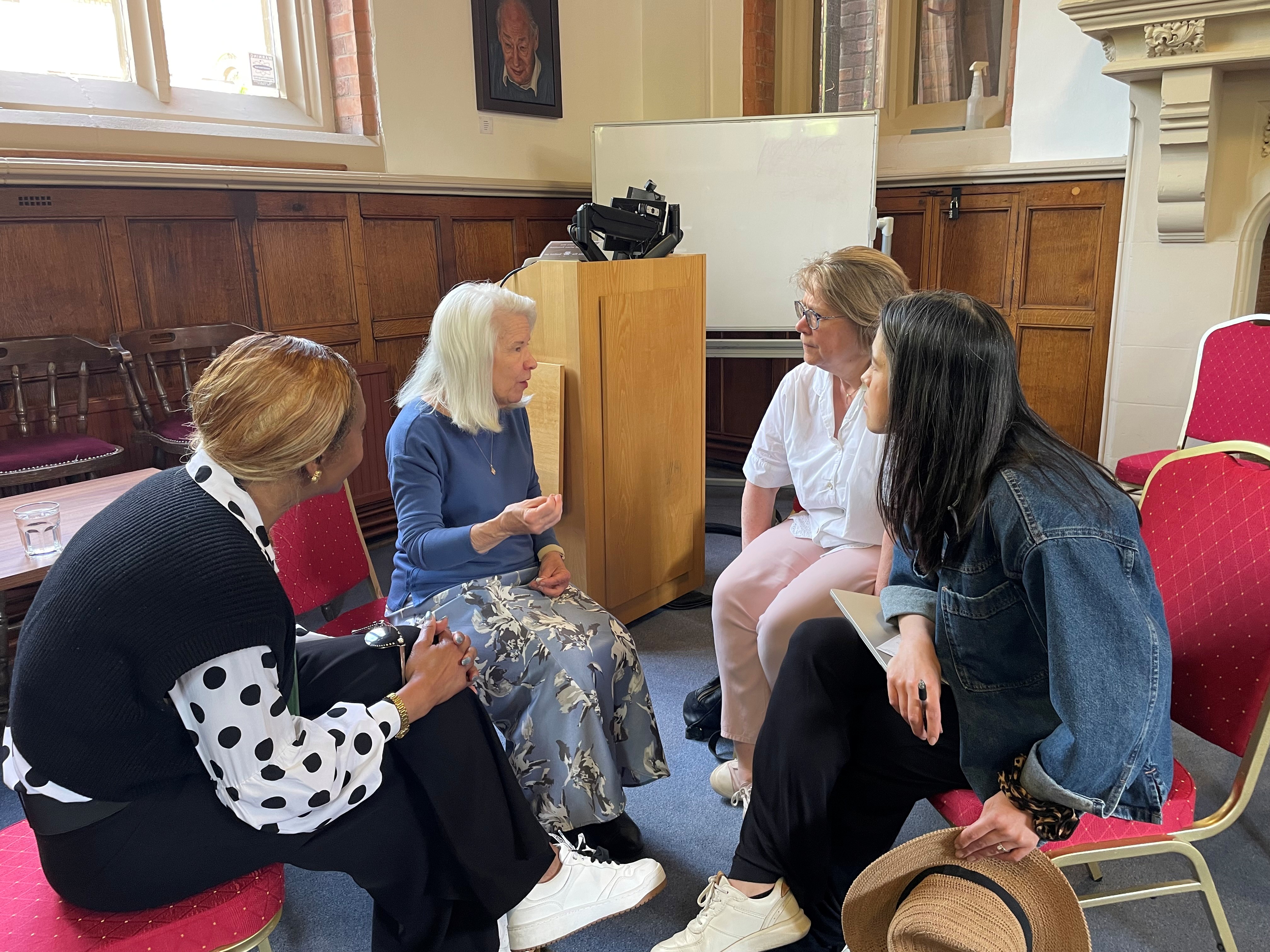 Sharon Birkman speaking to a group of students