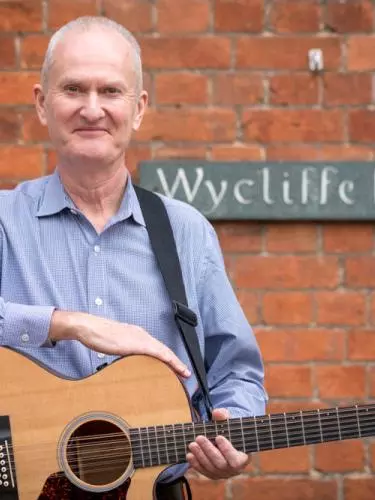 David Clifton in front of Wycliffe Hall sign