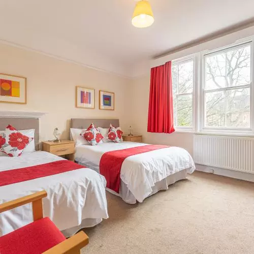 Bedroom with double and single beds